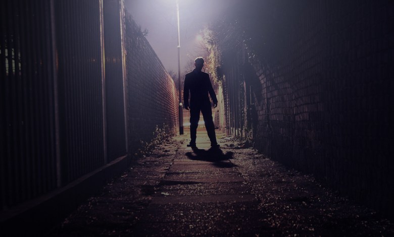 silhouette man alley
