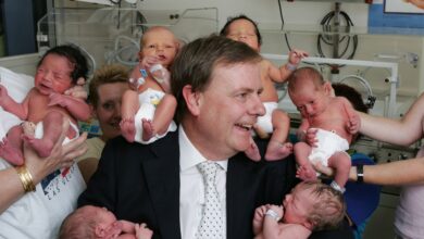 Then-treasurer Peter Costello with new born babies at Royal Women's Hospital in 2005. Picture: David Caird