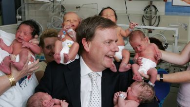 Then-treasurer Peter Costello with new born babies at Royal Women's Hospital in 2005. Picture: David Caird